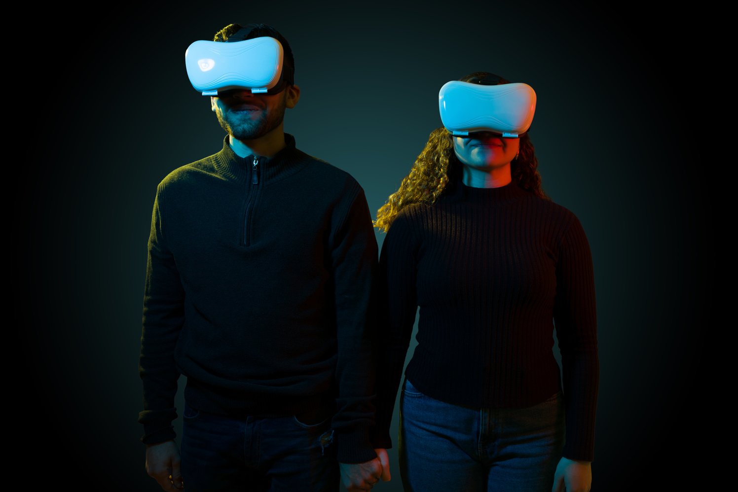 Boyfriend and girlfriend with virtual reality headsets